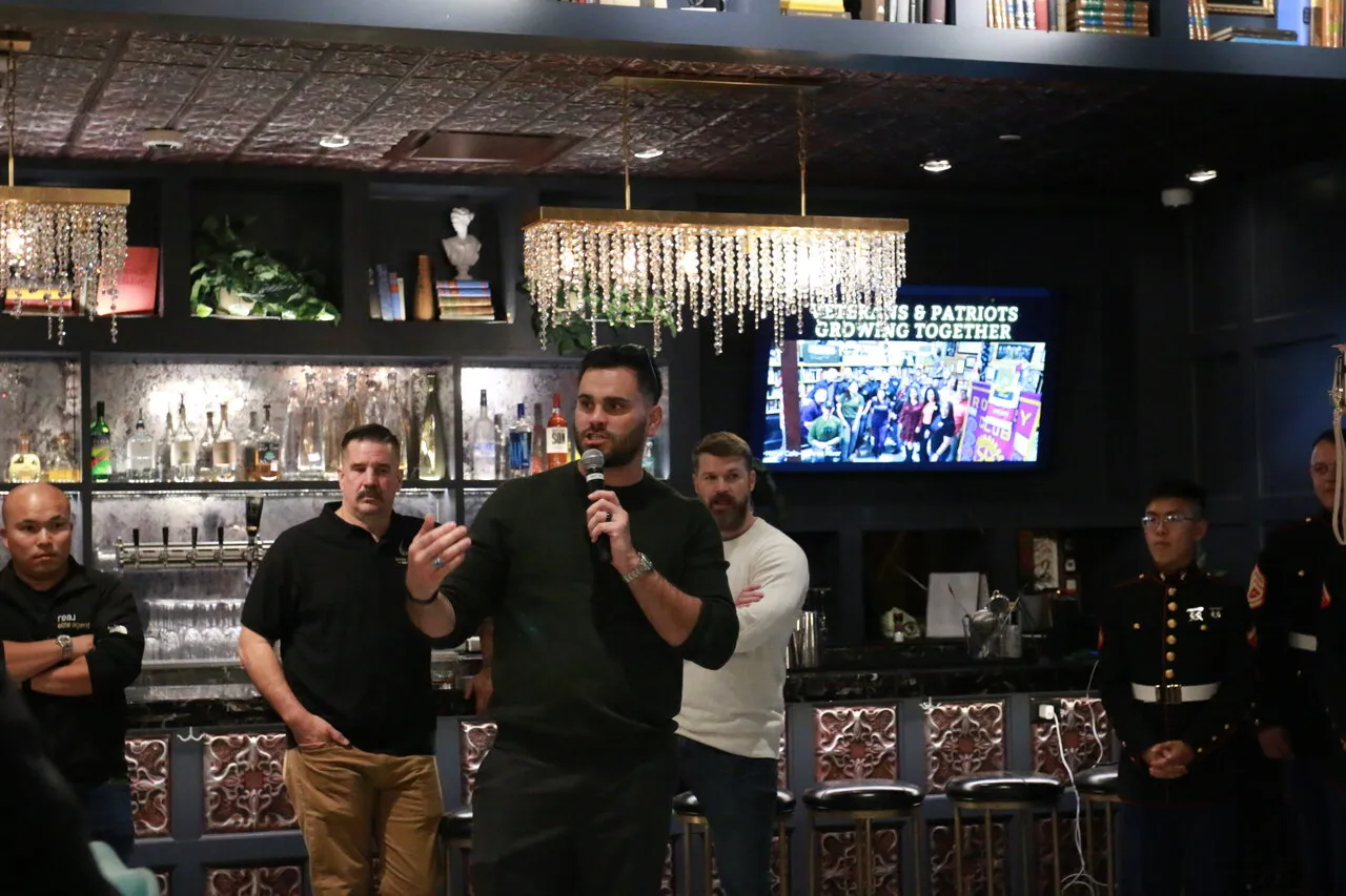 Speaker presenting to attendees during a community business event