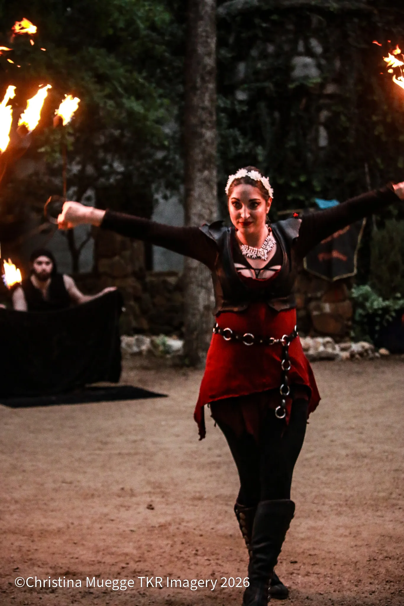 Fire performer creating an immersive festival moment during an outdoor event