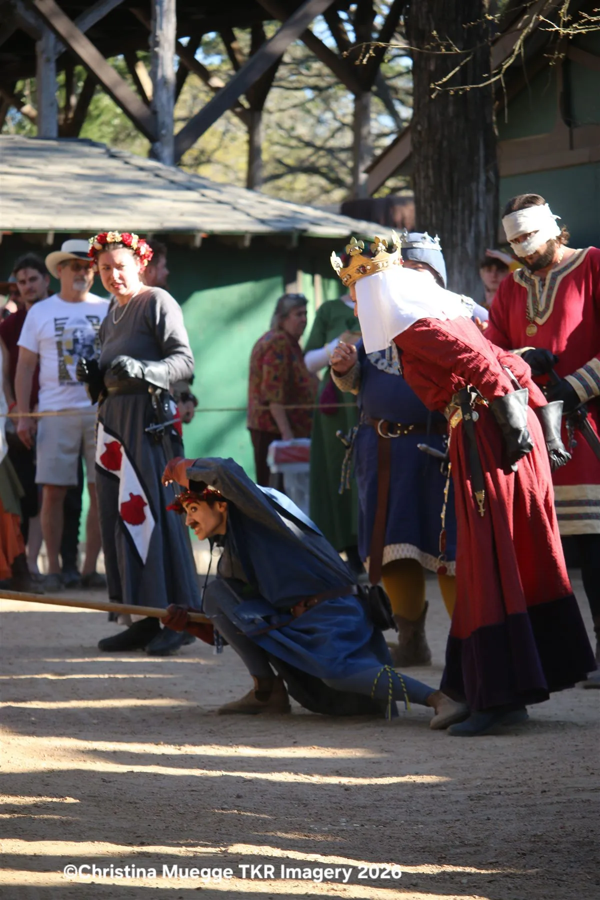 Renaissance festival royal court performers during an outdoor scene